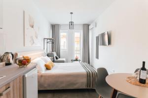 Katil atau katil-katil dalam bilik di MAGNOLIA SUITES