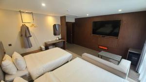 TV a/nebo společenská místnost v ubytování Hound Hotel Gijang Osiria