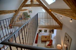 an overhead view of a staircase in a house at Gîte le Grenier GRAY in Gray