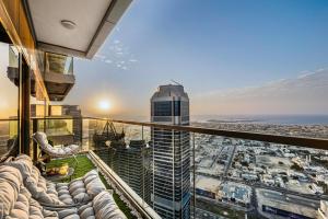 a view of the city from the top of a building at 64th floor Skyline Pool with Burj Khalifa View in Paramount Hotel Midtown in Dubai