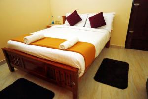 Postel nebo postele na pokoji v ubytování Jia Hill view rooms vagamon