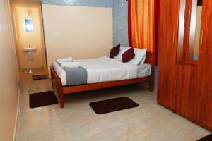 Postel nebo postele na pokoji v ubytování Jia Hill view rooms vagamon