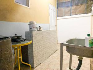 a kitchen with a sink and a counter and a tub at Nearly City, full facilities in Chiang Mai +28 photos