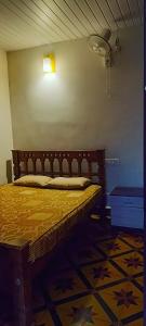 Postel nebo postele na pokoji v ubytování Verdant Vagamon Cottage