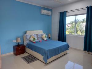 Postel nebo postele na pokoji v ubytování Blue Sky Self Catering