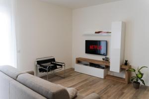TV a/nebo společenská místnost v ubytování ComfortHome Fiera