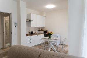 Kuchyň nebo kuchyňský kout v ubytování ComfortHome Fiera + 14 fotografií