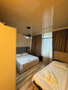Letto o letti in una camera di LUKA