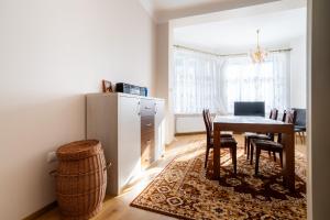 Kuchyňa alebo kuchynka v ubytovaní Victus Apartamenty, Apartament Harmony
