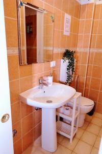 Ein Badezimmer in der Unterkunft Casa Gaby