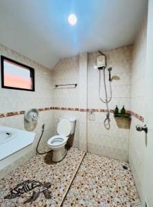 Koupelna v ubytování ไข่มุกรีสอร์ทเกาะล้าน + 35 fotografií