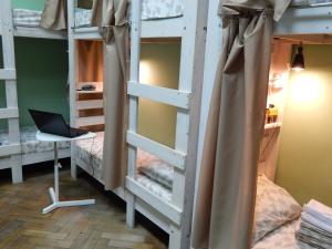 Postel nebo postele na pokoji v ubytování Мансарда
