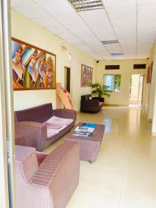 Χώρος καθιστικού στο Kigali Diplomat Hotel