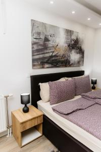 Postel nebo postele na pokoji v ubytování Guest House LILA