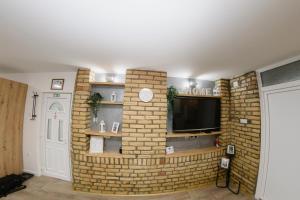 TV a/nebo společenská místnost v ubytování Guest House LILA