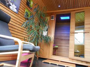 Istumisnurk majutusasutuses Bastogne Maison de vacances avec sauna