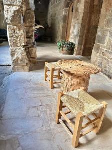 two chairs and a table and a table and chairs at Bayt Wadad, Bcharre Lebanon in Bcharré