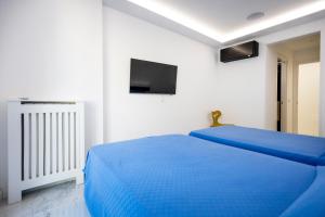 Postel nebo postele na pokoji v ubytování Suite Tropea