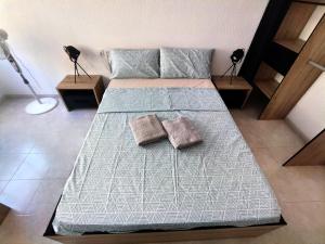 Postel nebo postele na pokoji v ubytování HABITACIONES EN APARTAMENTO COMPARTIDO w HOST