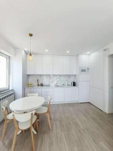 Nhà bếp/bếp nhỏ tại Oasis Beach Apartment