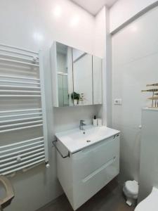 Phòng tắm tại Oasis Beach Apartment