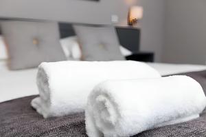 Postel nebo postele na pokoji v ubytování Citi Hotel Aberdeen