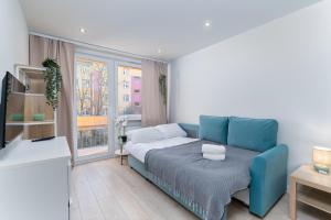 Postel nebo postele na pokoji v ubytování Nad Sudołem Stylish Apartment