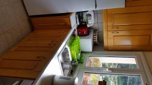 an interior view of an rv kitchen with a window at Alipa Beach Apartment in Paleokastritsa
