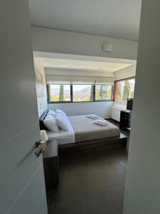 Postel nebo postele na pokoji v ubytování Elysian apartment II