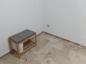 a bench sitting on top of a concrete floor at A casa di Elena e Francesco in Bernalda