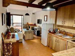 Kuchyň nebo kuchyňský kout v ubytování Aura de la Alpujarra
