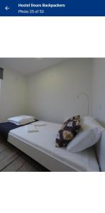 Postel nebo postele na pokoji v ubytování Travel INN Bukitbintang