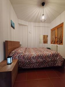 Postel nebo postele na pokoji v ubytování Casa Dami