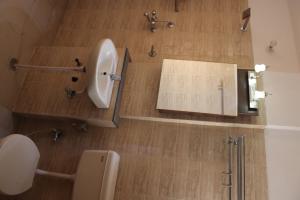 Koupelna v ubytování 3 BHK Apartment by Indo Vacations - Jaipur