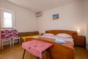 Posezení v ubytování Apartment Tina 6p + 14 fotografií