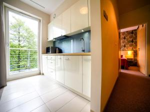 Kuchyňa alebo kuchynka v ubytovaní Golden Tulip Międzyzdroje Residence