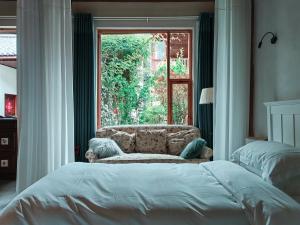 Fotografie z fotogalerie ubytování Jianchuan Shaxi Huasheli Inn v destinaci Diannan
