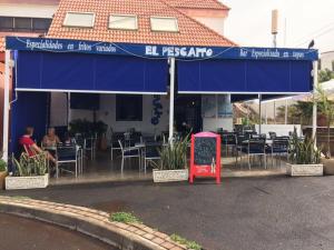 Reštaurácia alebo iné gastronomické zariadenie v ubytovaní Penthouse Palm Mar