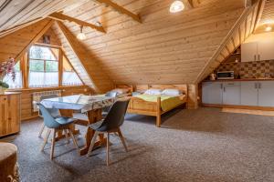 Giường trong phòng chung tại Galicówka Pokoje Gościnne