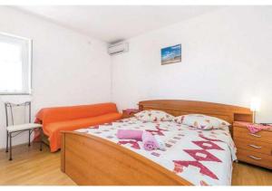 Postel nebo postele na pokoji v ubytování Apartment Tina 6p