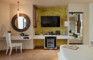 Телевізор і / або розважальний центр в Hotel Le Duc de Praslin