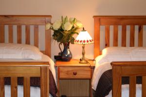 Ένα ή περισσότερα κρεβάτια σε δωμάτιο στο An Portán Guest House