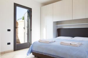 Ένα ή περισσότερα κρεβάτια σε δωμάτιο στο Agriturismo Le Site +72 φωτογραφίες
