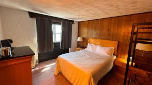 Ένα ή περισσότερα κρεβάτια σε δωμάτιο στο Davos Chalet