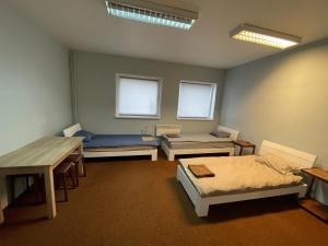Postel nebo postele na pokoji v ubytování HOSTEL/HOTELL 3A