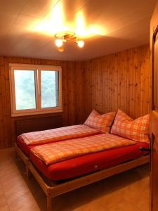 Ένα ή περισσότερα κρεβάτια σε δωμάτιο στο Haus Märzenhof