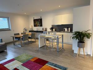 Køkken eller tekøkken på SunSet - Moderne City Apartments in direkter Altstadt Lage & DOM