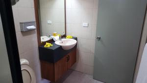 A bathroom at Hexagon International Hotel, Villas & Spa