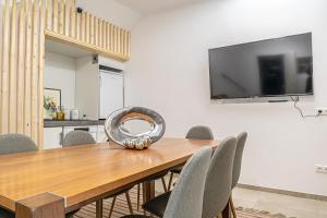 TV o dispositivi per l'intrattenimento presso Elegant & Air condition 5BR - By The Danube River