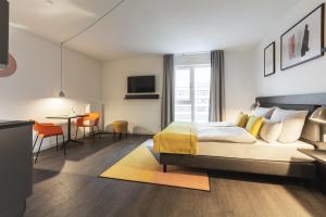 Postel nebo postele na pokoji v ubytování Candlewood Suites Berlin Charlottenburg by IHG